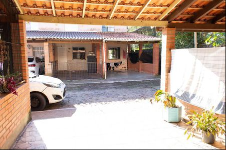 Sala - Vista de casa de condomínio para alugar com 2 quartos, 68m² em Vila Nova, Porto Alegre