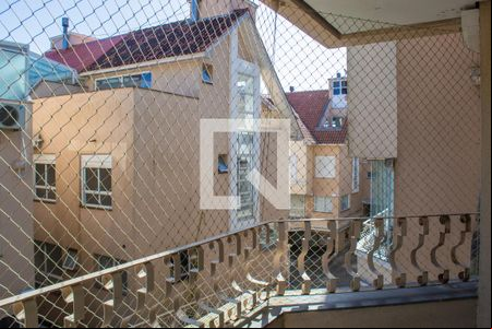 Varanda de casa de condomínio à venda com 4 quartos, 230m² em Pedra Redonda, Porto Alegre
