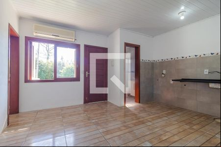 Sala / Cozinha de casa de condomínio para alugar com 1 quarto, 32m² em Vila Nova, Porto Alegre